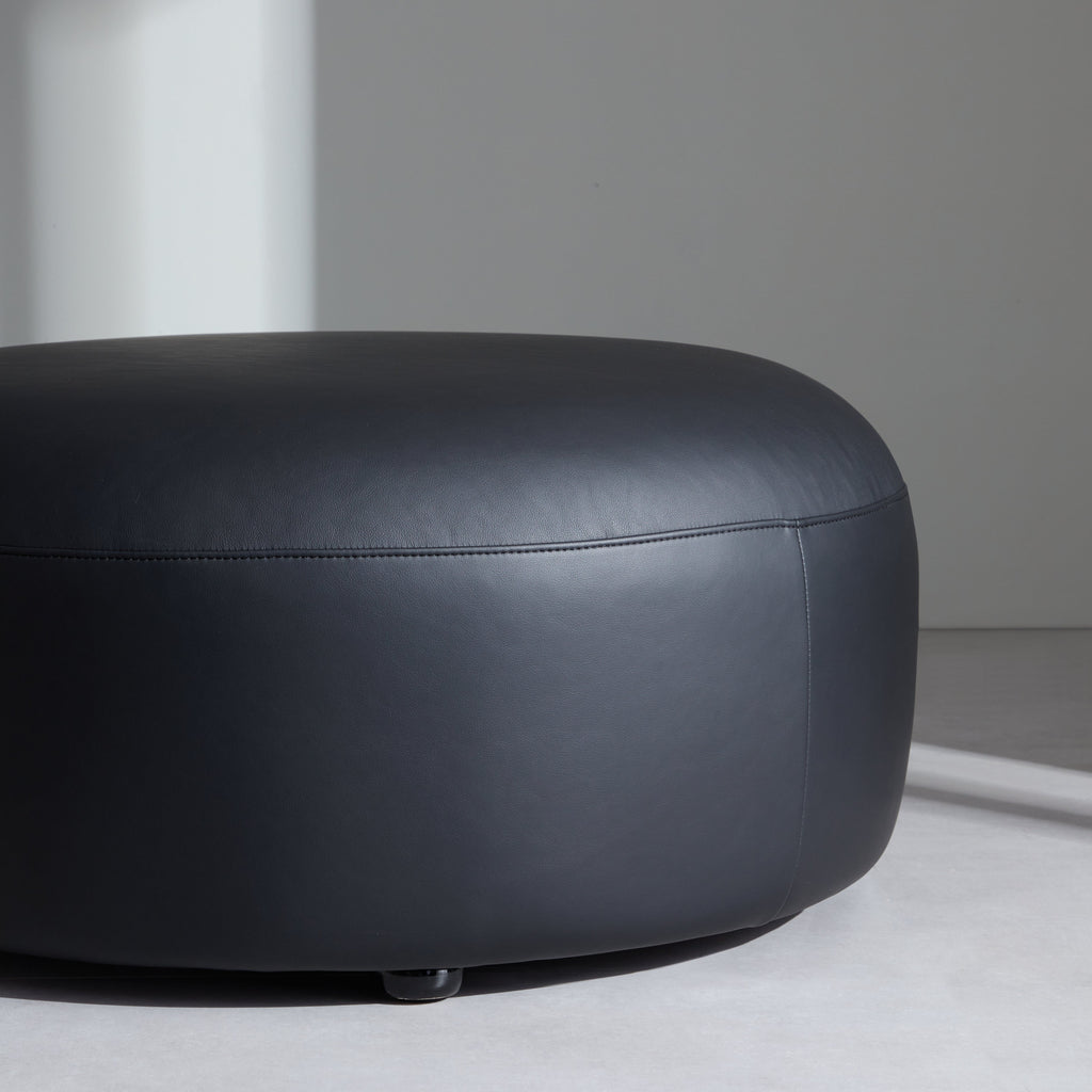 Monolith Round Black Leather Ottoman