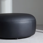 Monolith Round Black Leather Ottoman