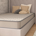 Matelas hybride à ressorts et plateau moyen