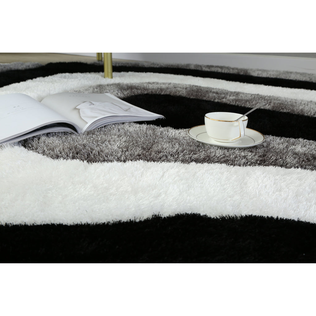 Tapis à poils longs Mateos au design abstrait
