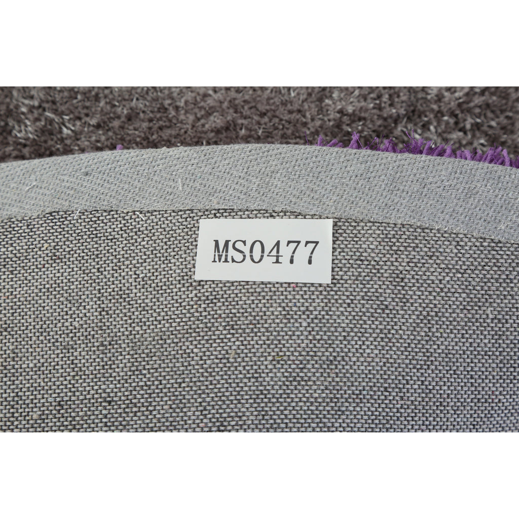 Tapis à poils longs Mateos au design abstrait